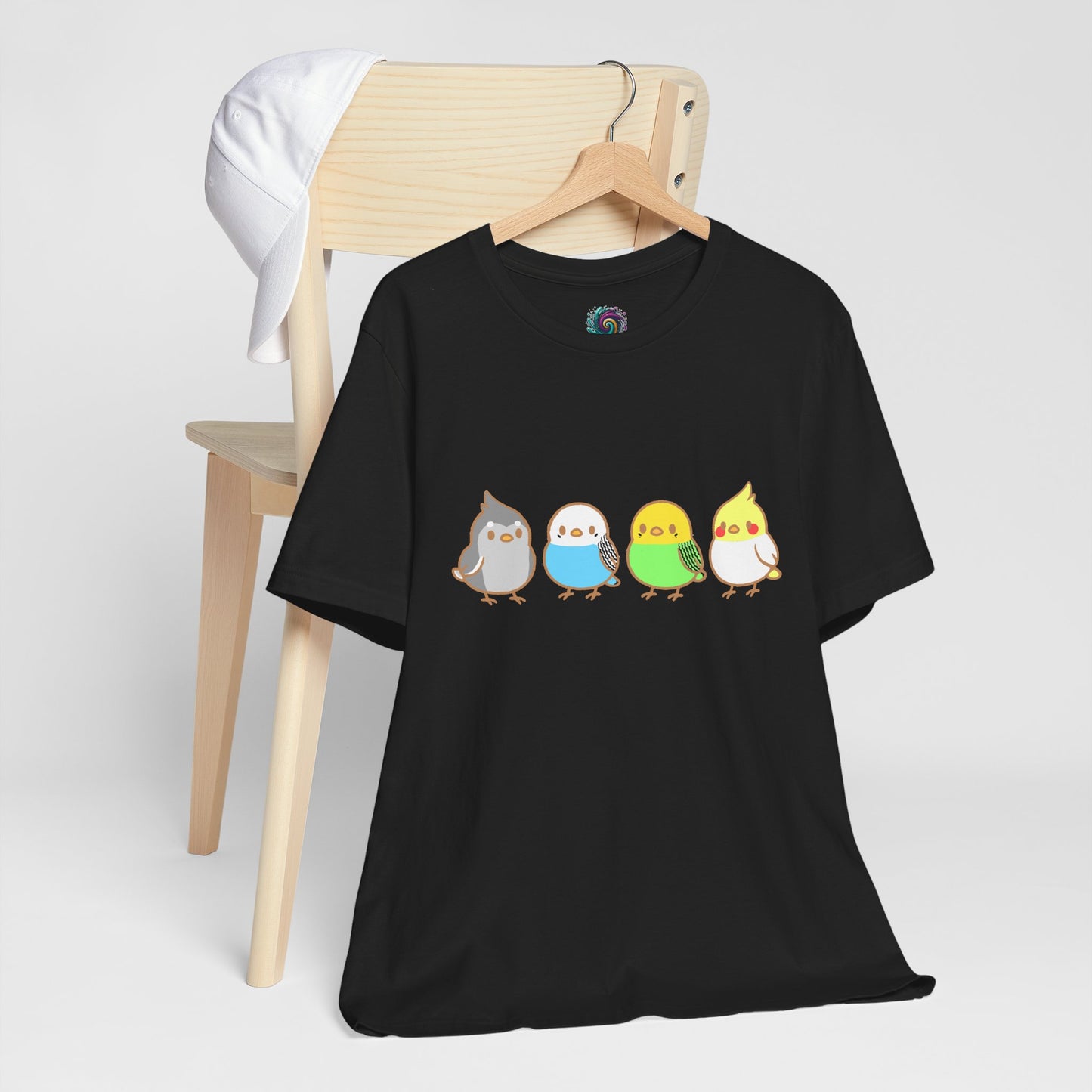 Black Chirpy Flock Bird T-Shirt from WhimSpin 4 chibi cartoon pet birds lined up in a row.