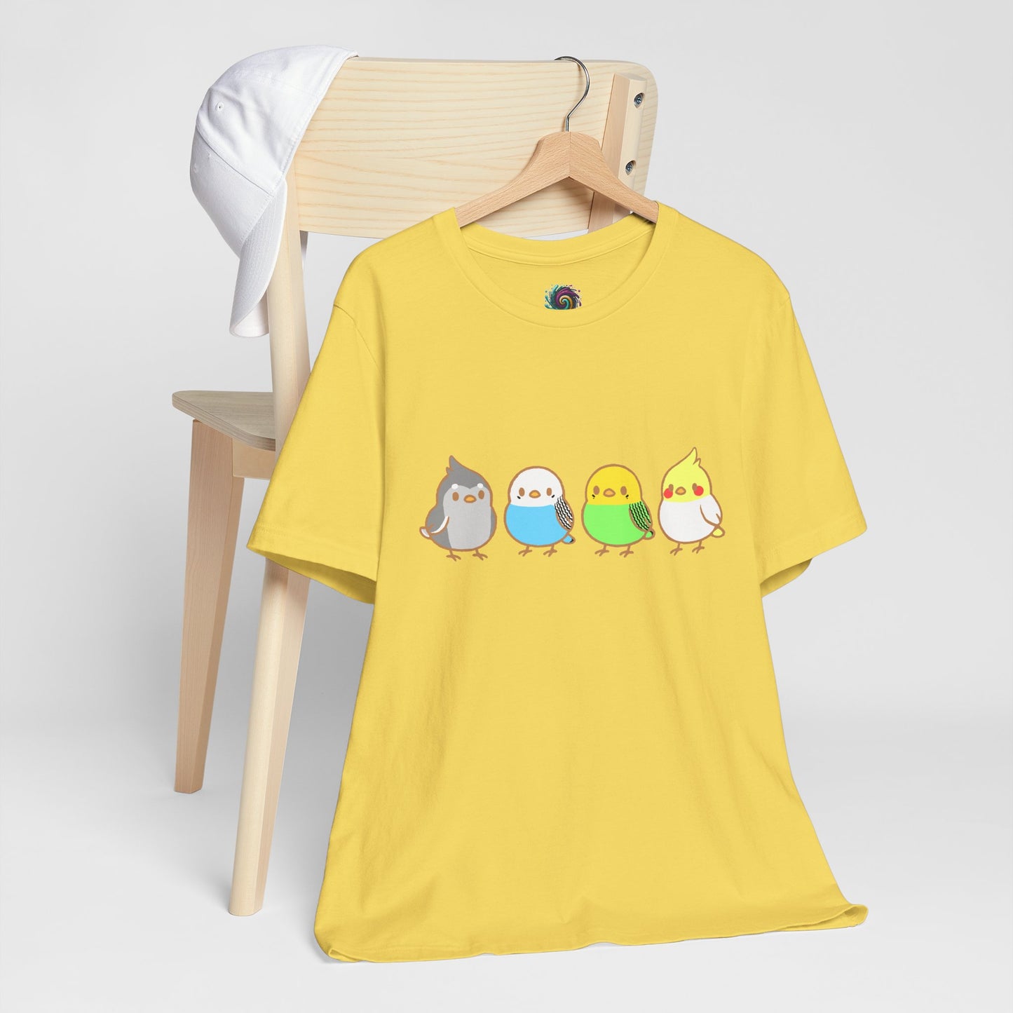Chirpy Flock Bird T-Shirt from WhimSpin 4 chibi cartoon pet birds lined up in a row.