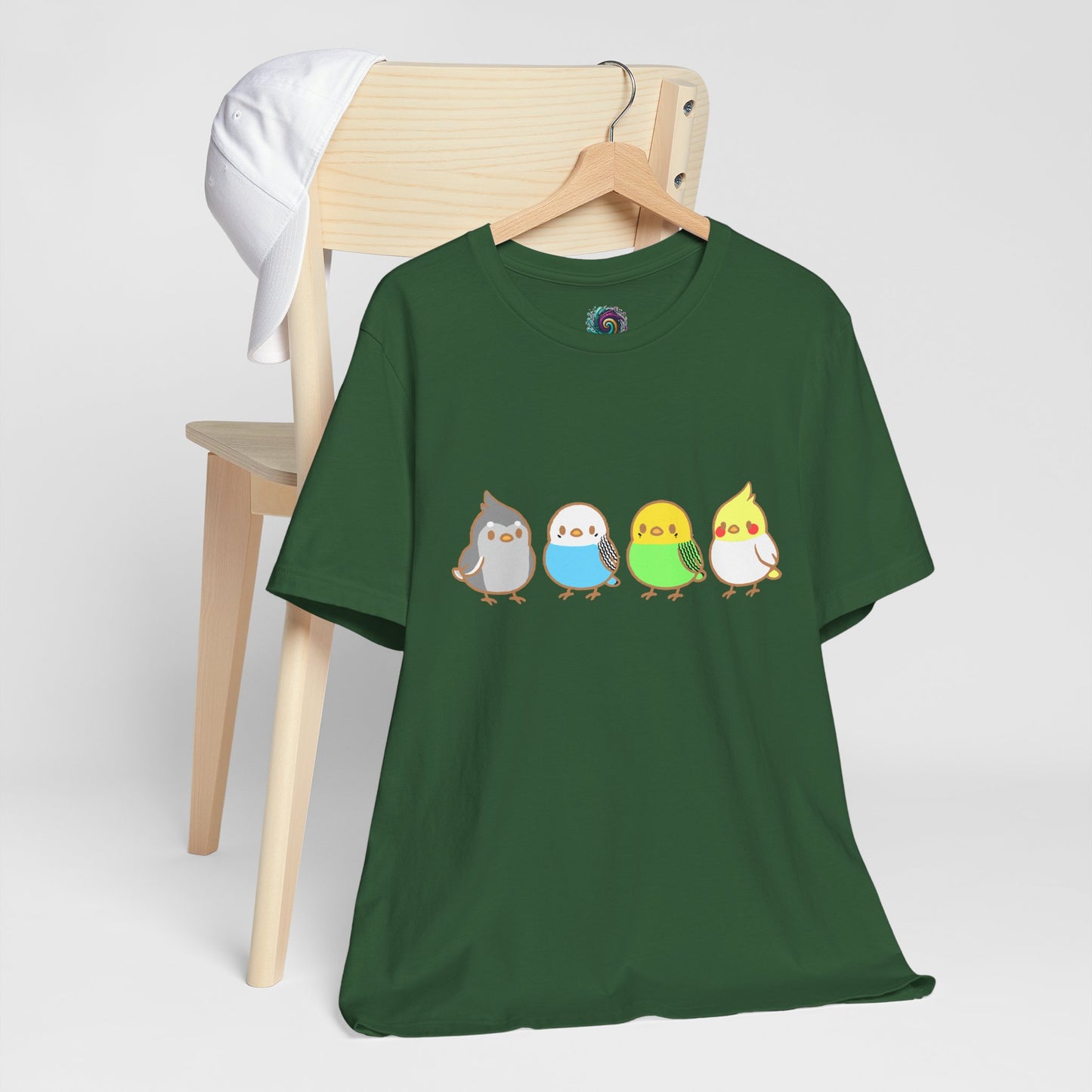Chirpy Flock Bird T-Shirt from WhimSpin 4 chibi cartoon pet birds lined up in a row.