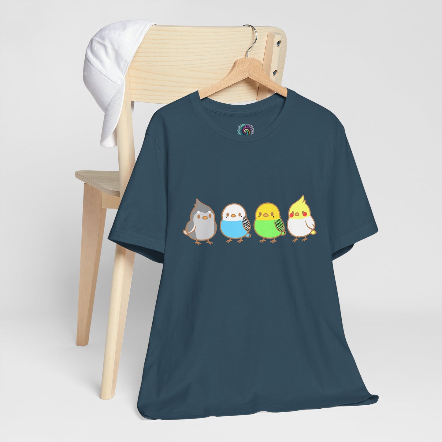 Dark Teal Chirpy Flock Bird T-Shirt from WhimSpin 4 chibi cartoon pet birds lined up in a row.