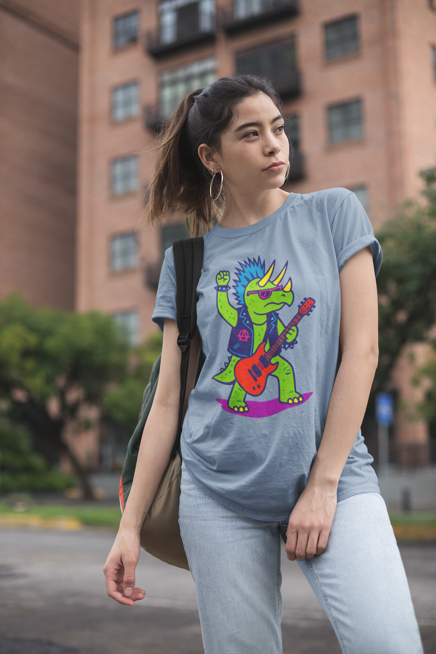 Punk Rock Triceratops T-Shirt – Funny Dinosaur Tee for Adults in steel blue, showcasing a vibrant punk dinosaur rocker with mohawk and guitar, ideal for music fans and dinosaur lovers.