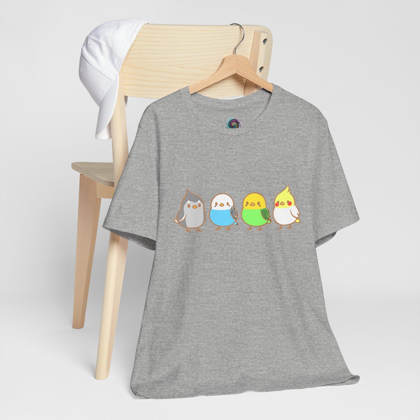 Chirpy Flock Bird T-Shirt from WhimSpin 4 chibi cartoon pet birds lined up in a row.