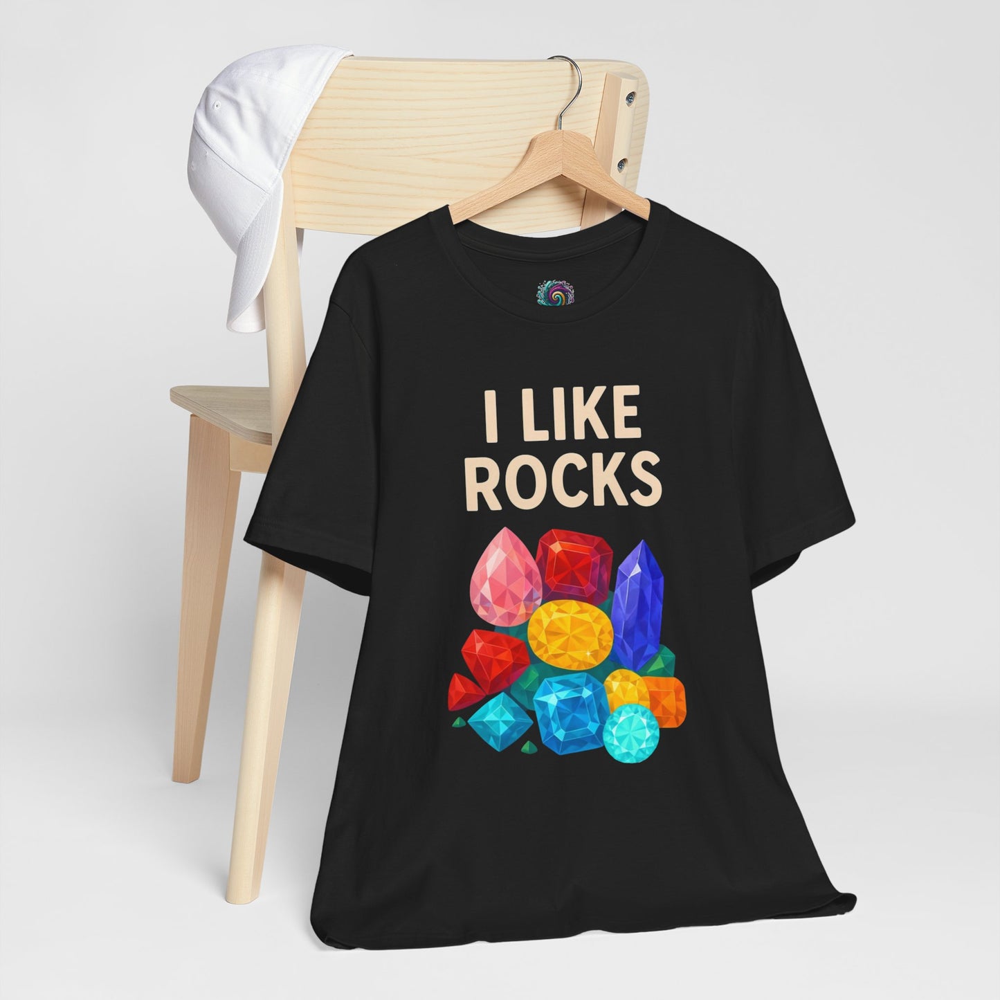 Black t-shirt with colorful gemstones and 'I Like Rocks' text on a white background inspired by the I like rocks meme