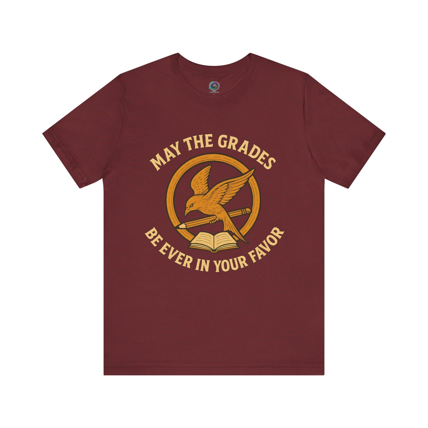 Maroon "May the Grades Be Ever In Your Favor" by WhimSpin. The image on the shirt features a parody of the Mockijay design from the cover of the Hunger Games books