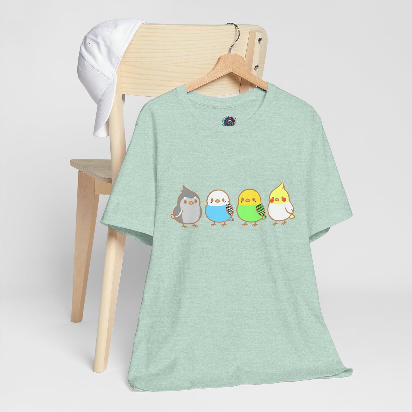 Chirpy Flock Bird T-Shirt from WhimSpin 4 chibi cartoon pet birds lined up in a row.