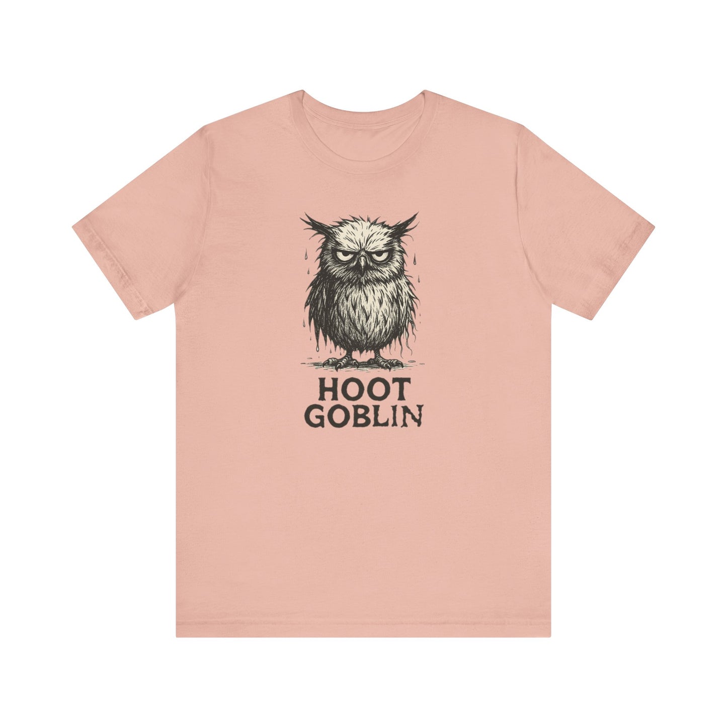Peach t-shirt with an owl graphic and 'Hoot Goblin' text on a white background