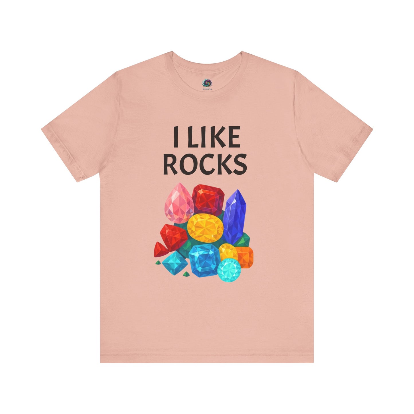 Peach t-shirt with 'I Like Rocks' text and colorful gemstone graphics on a white background