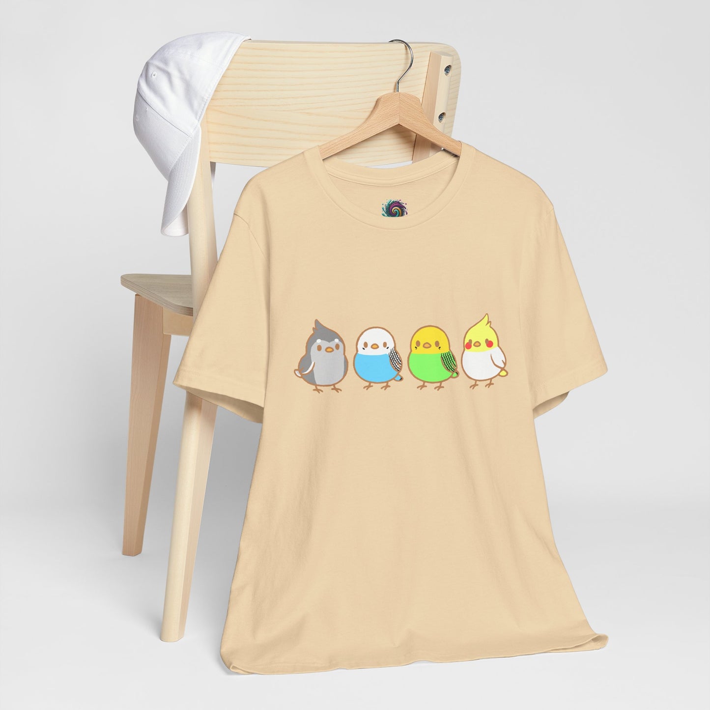 Chirpy Flock Bird T-Shirt from WhimSpin 4 chibi cartoon pet birds lined up in a row.