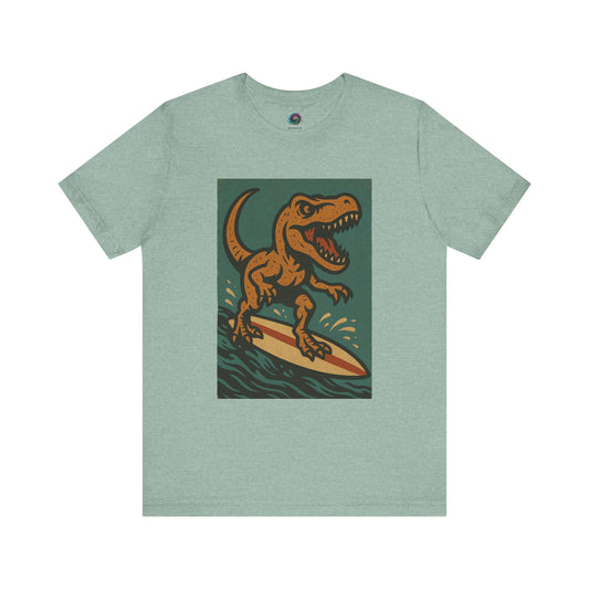 Surfing T-Rex T-Shirt – Funny Dinosaur Surfing Graphic Tee in heather prism, great for dinosaur beach wear and quirky summer tees mixing pastel surf tee aesthetic with dinosaur vacation humor..