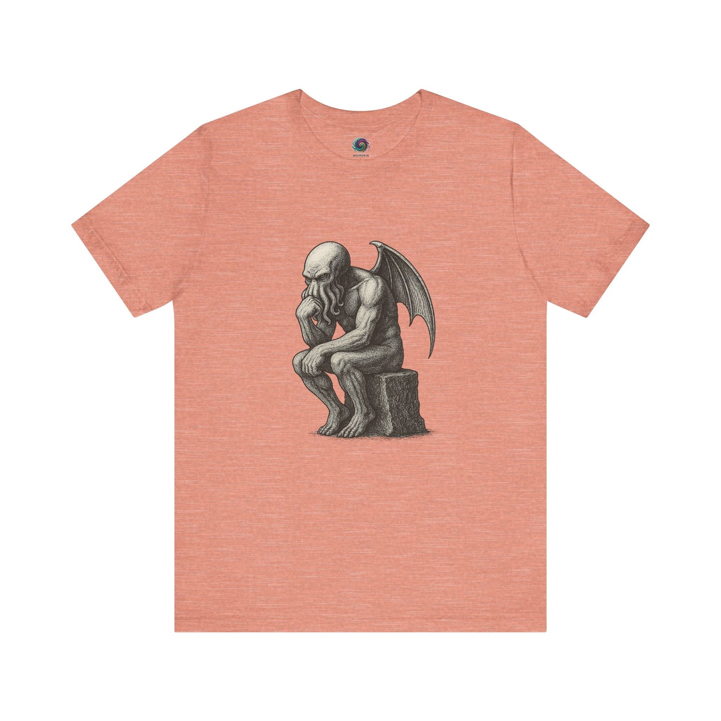 Peach-colored t-shirt with a black and white illustration of Cthulhu posed as Rodin's The Thinker. The tee shirt is displayed on a hite background.