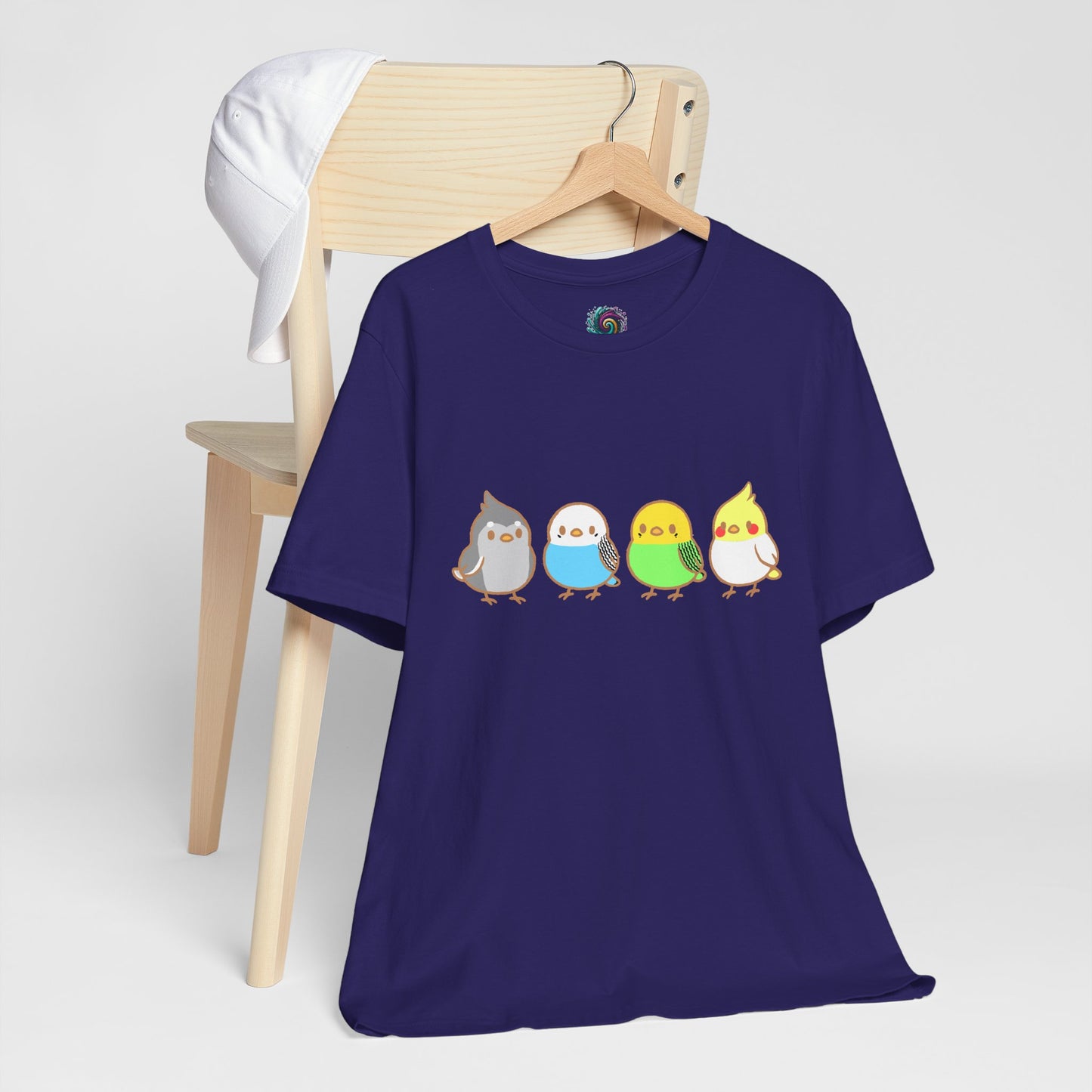 Chirpy Flock Bird T-Shirt from WhimSpin 4 chibi cartoon pet birds lined up in a row.