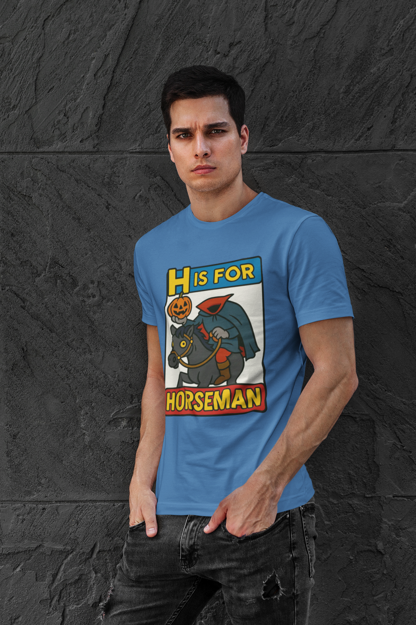 H is for Horseman T-Shirt – Headless Horseman Halloween Tee in true royal, modeled casually, a Halloween horseman shirt with cartoon alphabet artwork.