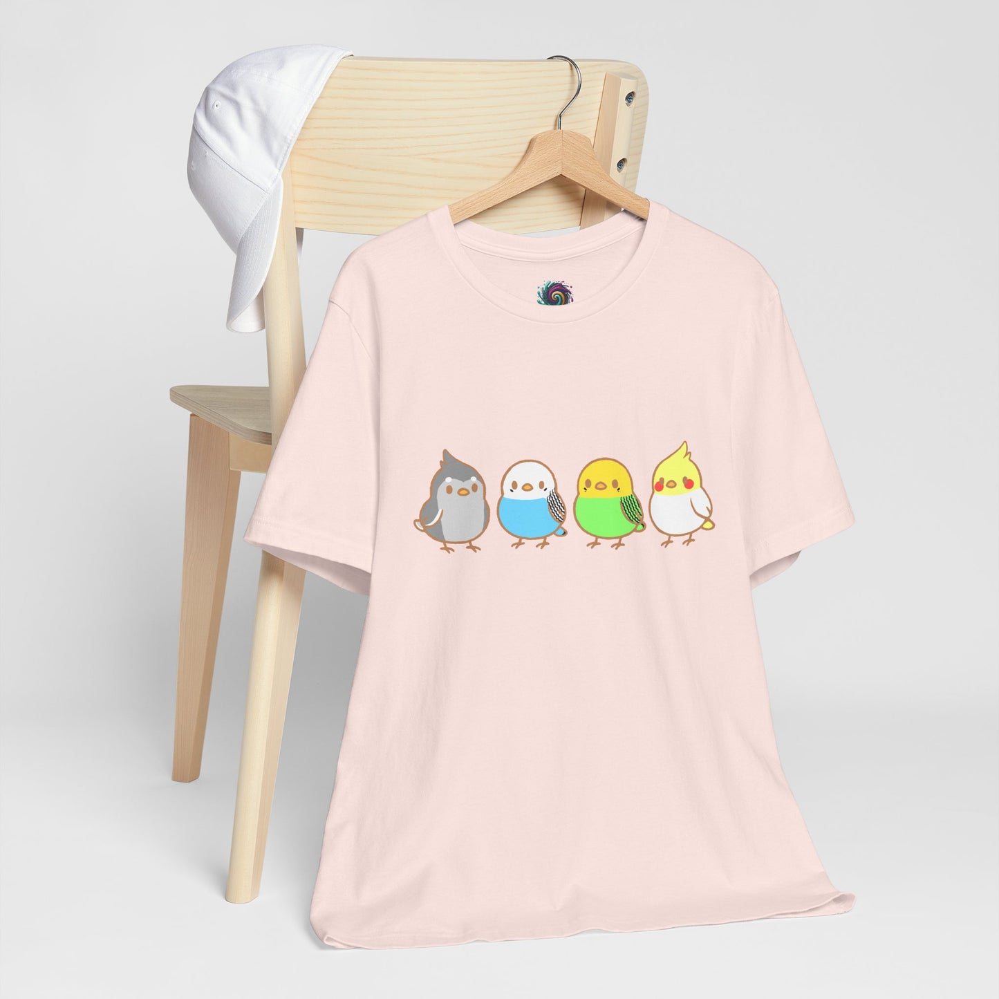 pink Chirpy Flock Bird T-Shirt from WhimSpin 4 chibi cartoon pet birds lined up in a row.