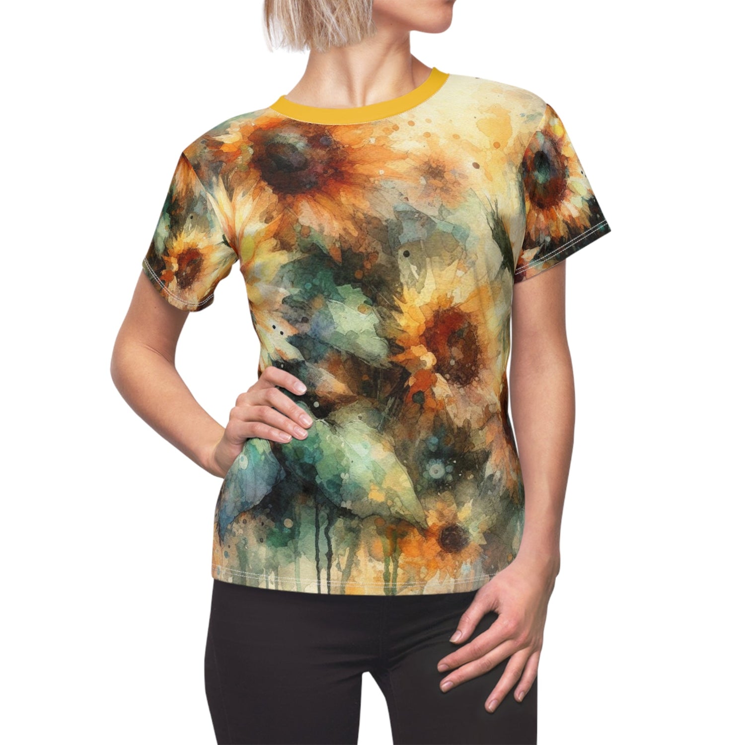 A woman wearing an all-over-print tshirt featuring watercolor sunflowers