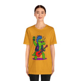 Adult mustard/orange graphic t-shirt with punk triceratops and red guitar, front
