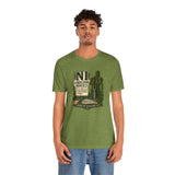 Green crewneck T-shirt with chest graphic showing NL landscaping service