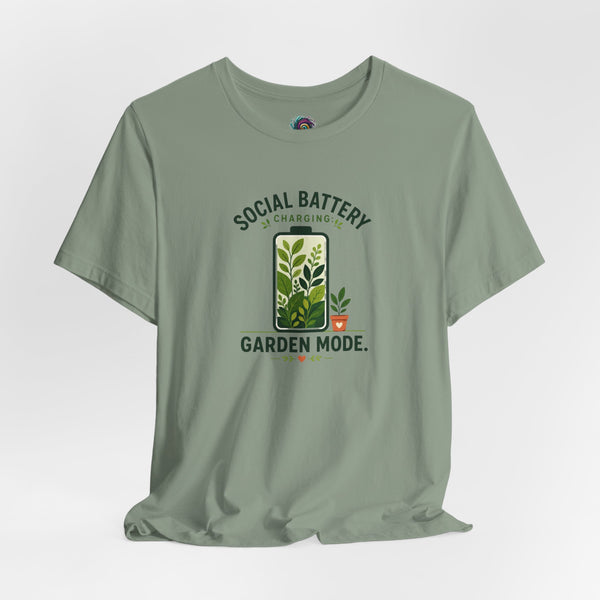 Sage green crew-neck T-shirt with “SOCIAL BATTERY” plant and “GARDEN MODE” text