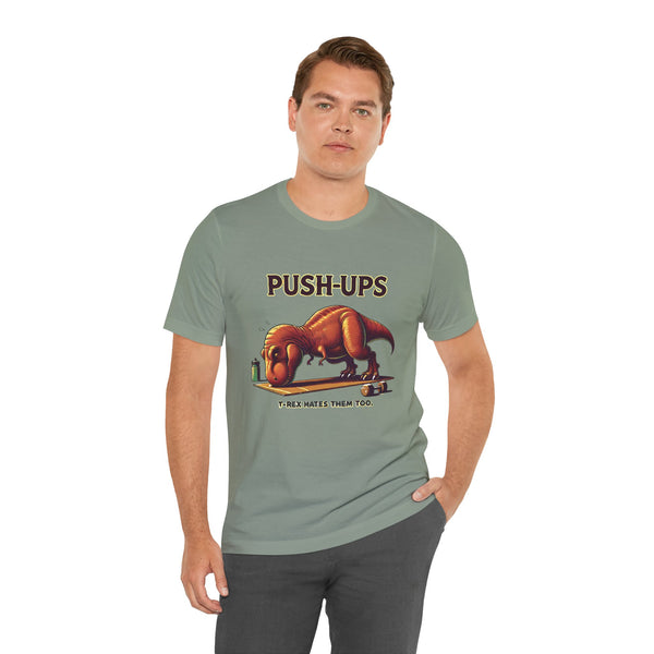 Green graphic T-shirt on model with T-rex “Push-ups” workout slogan print