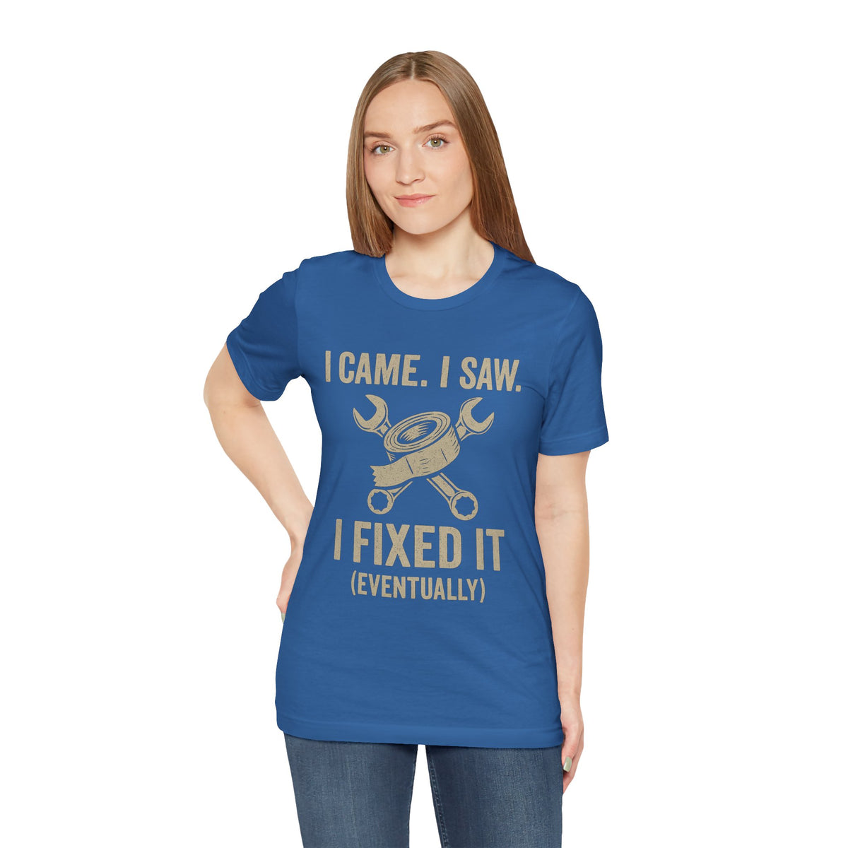 Blue crewneck T-shirt with gold “I Came, I Saw… I Fixed It (Eventually)” graphic print.