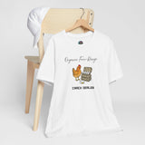 White crew-neck t-shirt on a wooden hanger with chicken and egg carton print