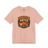 Peach graphic T-shirt with Pumpkin Patch Social Club pumpkin logo