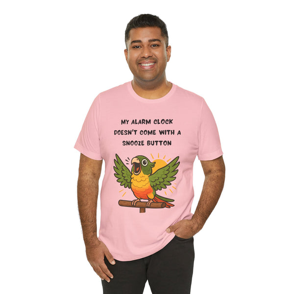 Pink parrot alarm T-shirt on model, front conure illustration and “My alarm clock” text
