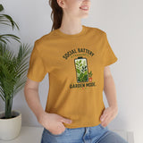 Mustard yellow crewneck T-shirt with front plant graphic and “Social Battery” line.