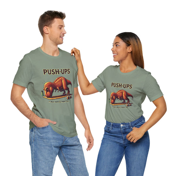 Sage green T-shirt with dinosaur 'Push-Ups' front graphic, worn by two people