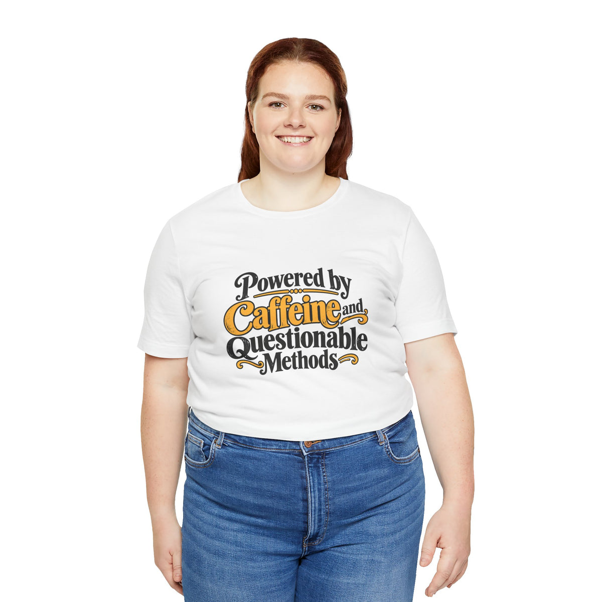 White crew-neck short-sleeve T-shirt worn by model with "Powered by Caffeine and Questionable Methods"