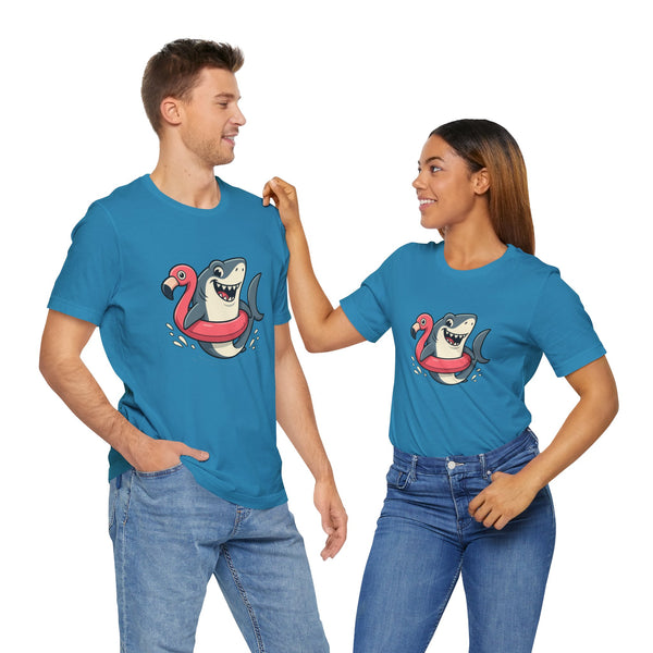 Two aqua blue t-shirts with shark and flamingo floatie graphic, standing together