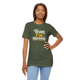 Olive green crewneck t-shirt with 'Team Cat, Obviously' front graphic, hand on hip