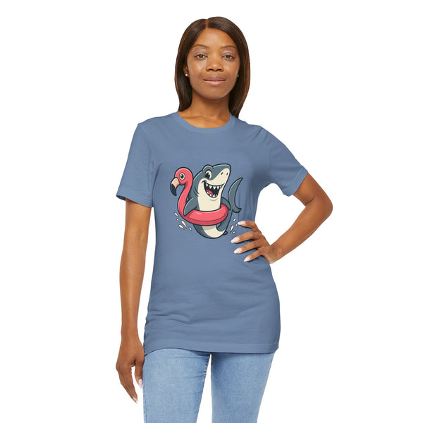Blue crew-neck T-shirt with shark and flamingo graphic front; on model