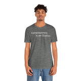 Dark grey heather crewneck t-shirt on model, front view with centered “Consciousness is an illusion”