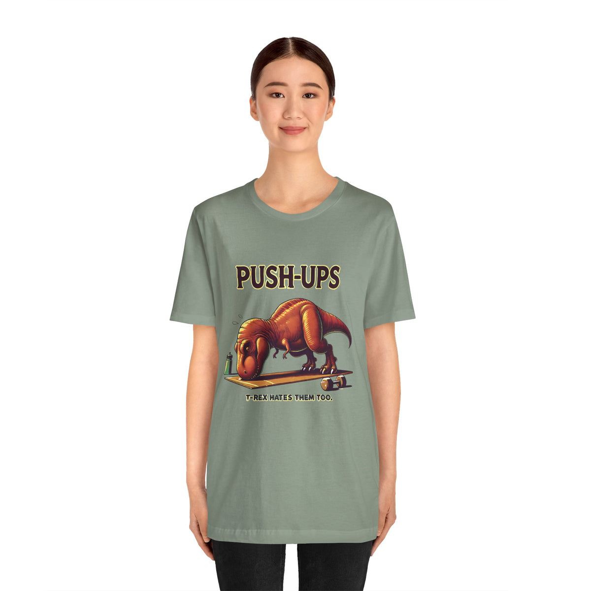 Green graphic T-shirt with T-rex “Push-ups” workout slogan front print