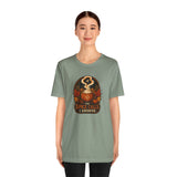 Sage green crewneck T-shirt with front pumpkin spice graphic, straight hem.