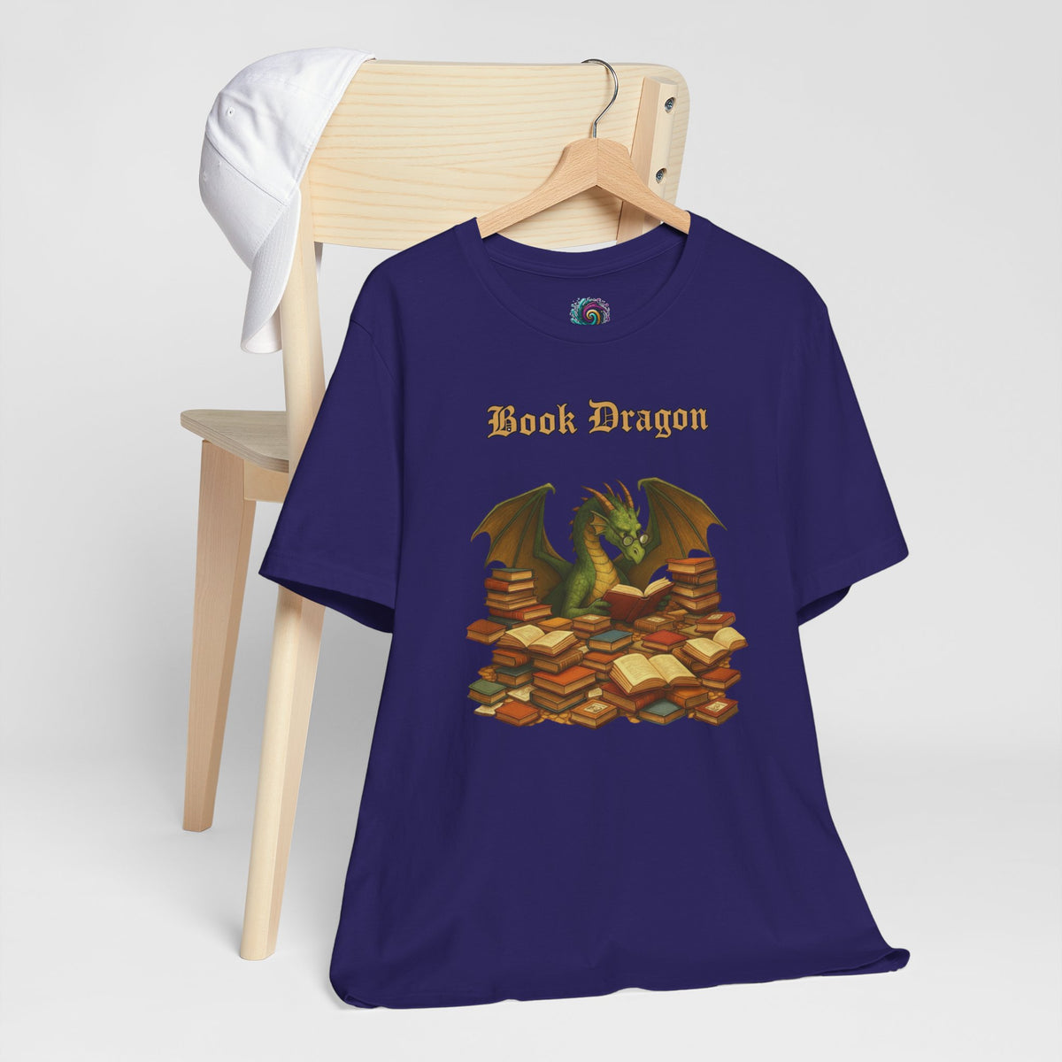 Navy t-shirt with dragon and stacked books graphic, crew neck short sleeves