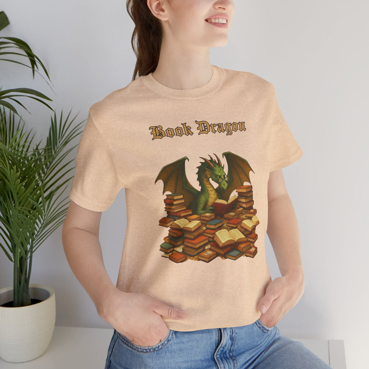 Tan crew-neck t-shirt with Book Dragon graphic, short sleeves