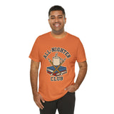 Orange T-shirt with caffeine cup, crossed pencils, and books graphic