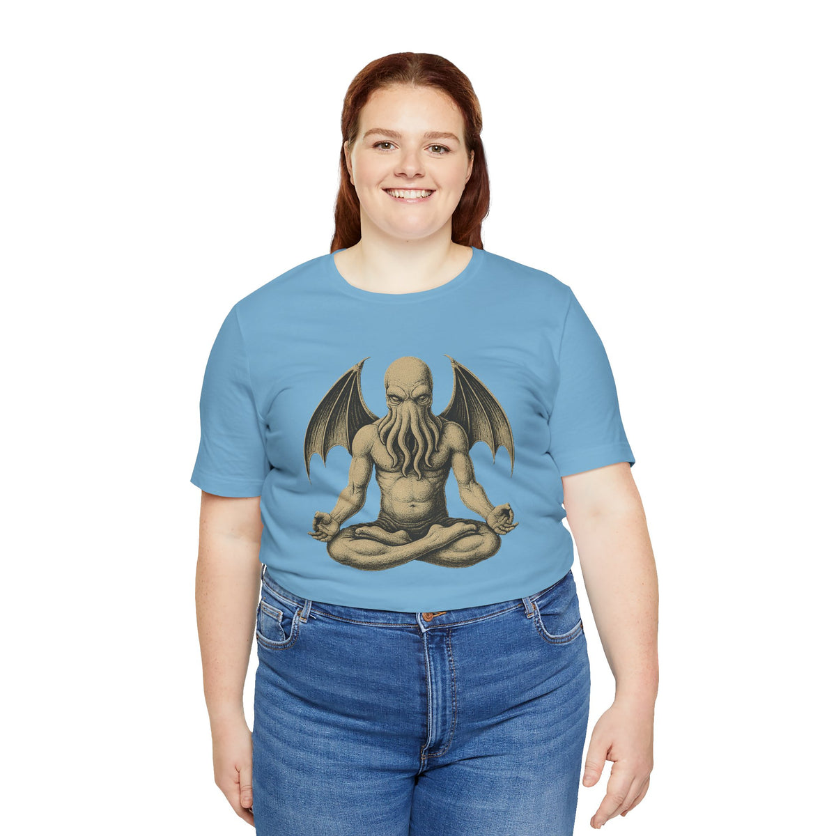 Light blue unisex crewneck t-shirt with meditating monster graphic, fuller fit