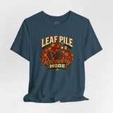 Deep teal crew-neck t-shirt with Leaf Pile Recovery Mode fall leaves graphic