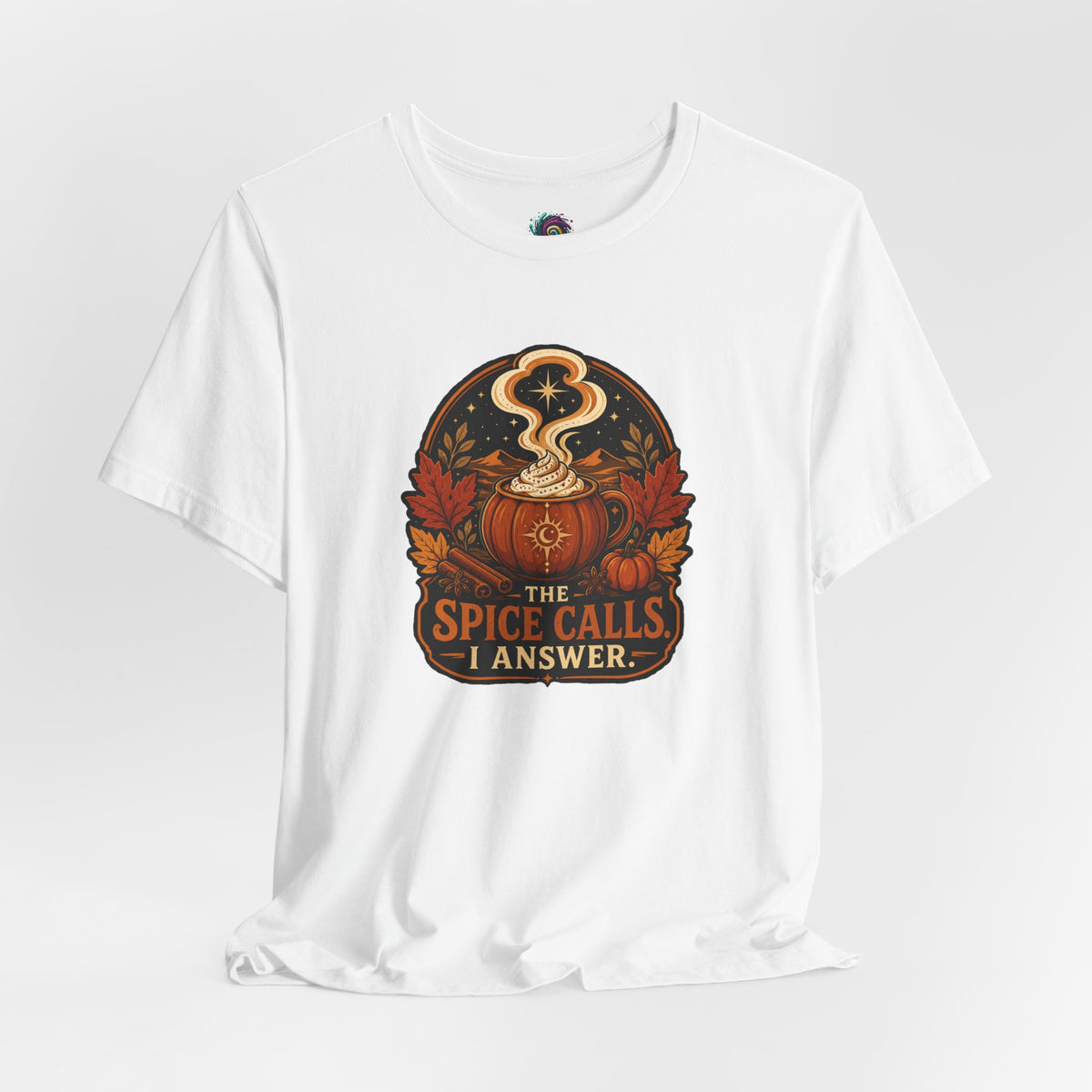 White crew-neck T-shirt with pumpkin-spice cauldron graphic, flat lay