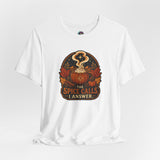 White crew-neck T-shirt with pumpkin-spice cauldron graphic, flat lay
