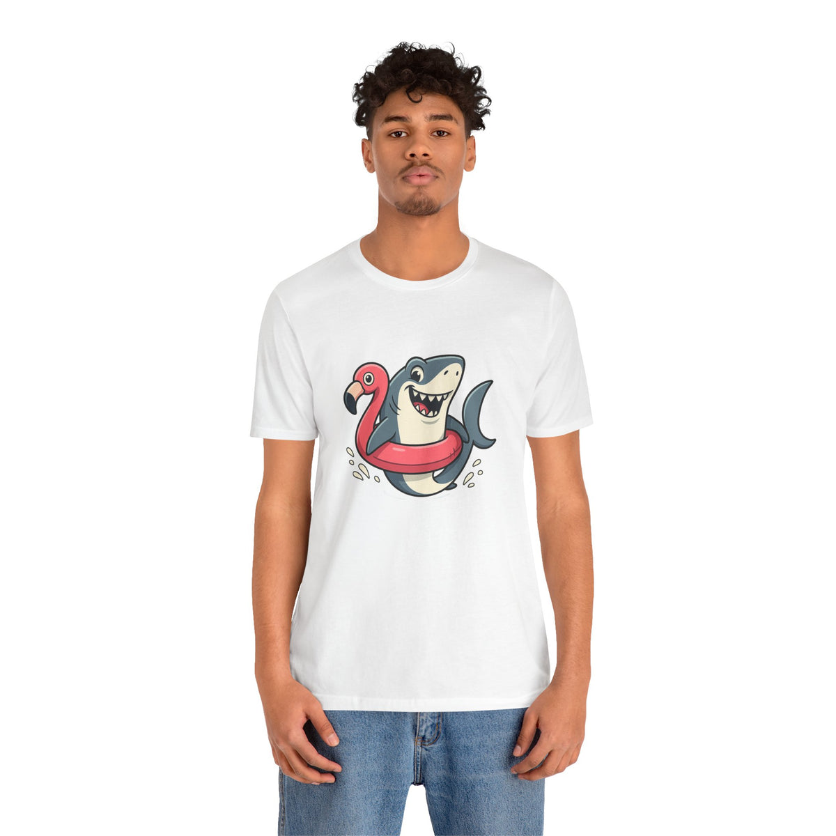 White crew-neck T-shirt with shark and flamingo float cartoon graphic centered on chest