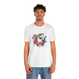 White crew-neck T-shirt with shark and flamingo float cartoon graphic centered on chest