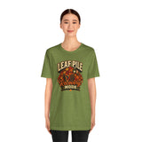 Green crewneck T-shirt with Leaf Pile Recovery Mode autumn leaves graphic