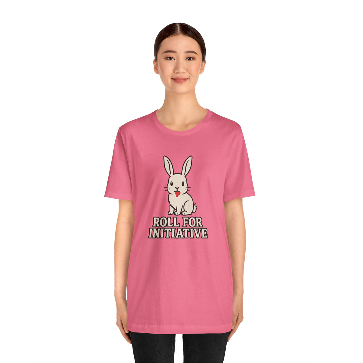 Pink short-sleeve T-shirt with bunny illustration and “Roll for Initiative” print