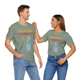 Sage green short-sleeve crewneck T-shirt with “Espresso Patronum” coffee cup artwork