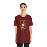 Burgundy crew-neck T-shirt on model with Pumpkin Spice “Has Entered the Chat” graphic
