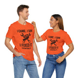 Two people wearing orange crewneck T-shirts with matching repair-themed front graphic
