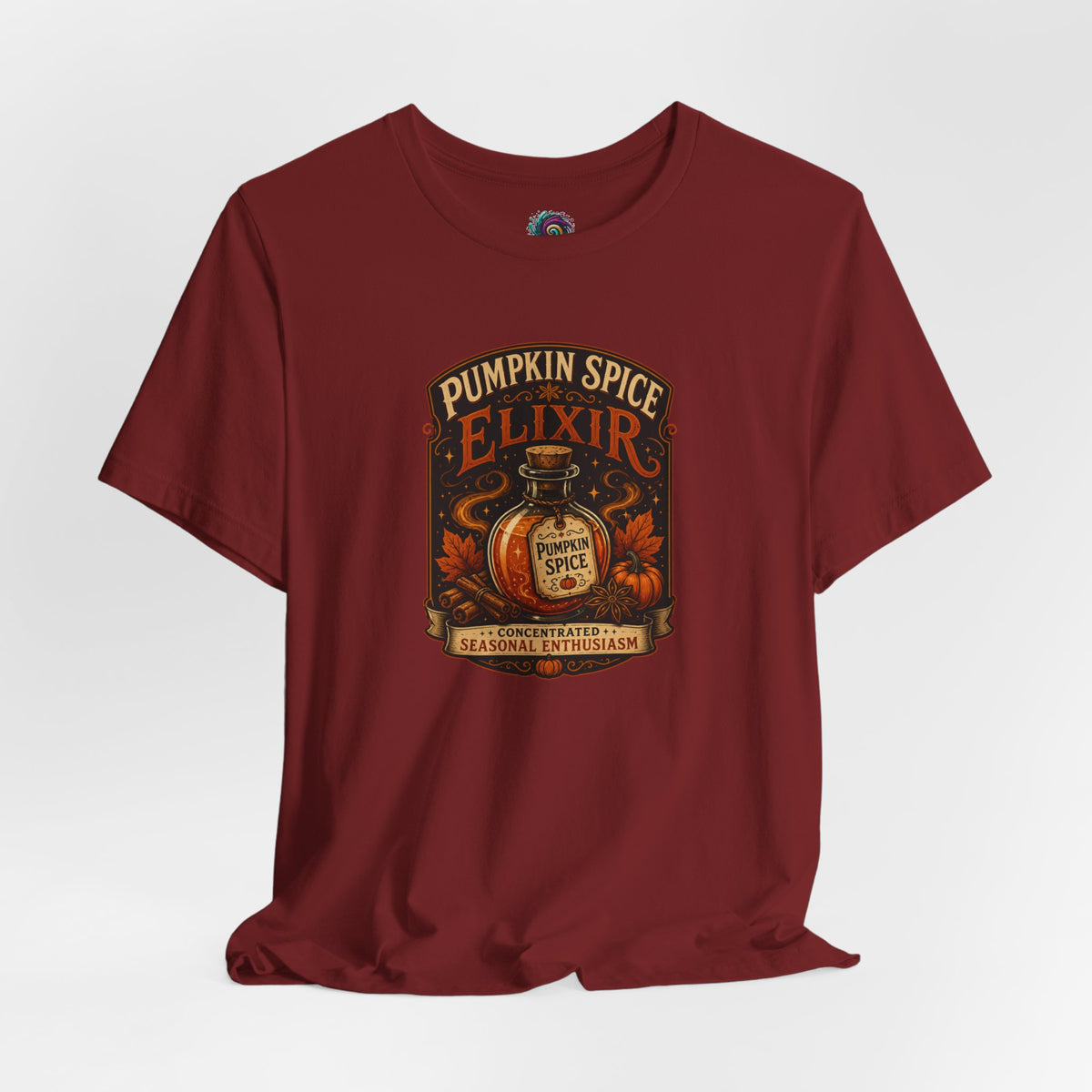 Maroon crew-neck T-shirt with pumpkin elixir themed front graphic